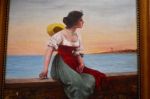 La donna sul muretto